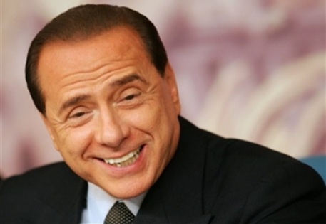 Берлускони насчитал у себя во рту 35 зубов
