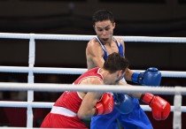 Сакен Бибосынов (в синем). Фото: olympic.kz/Сали Сабиров©