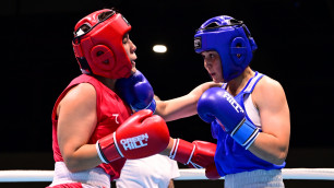 Аяулым Оспанова (в синем). Фото: ©Арлан Олжабай