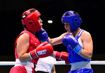 Аяулым Оспанова (в синем). Фото: ©Арлан Олжабай