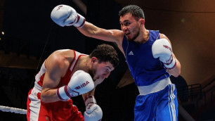 Ерасыл Жакпеков против Джамбулата Бижамова. Фото: IBA©