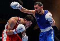 Ерасыл Жакпеков против Джамбулата Бижамова. Фото: IBA©