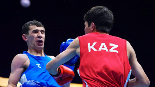 Санжар Ташкенбай против Асильбека Жалилова. Фото: instagram.com/boxingkazakhstan©