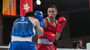 Хасанбой Дусматов и Сакен Бибосынов. Фото: Qaz_Olympics/Tengrinews©Турар Казангапов