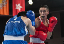 Хасанбой Дусматов и Сакен Бибосынов. Фото: Qaz_Olympics/Tengrinews©Турар Казангапов