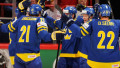 Хоккеисты сборной Швеции. Фото Richard Wolowicz/HHOF-IIHF Images