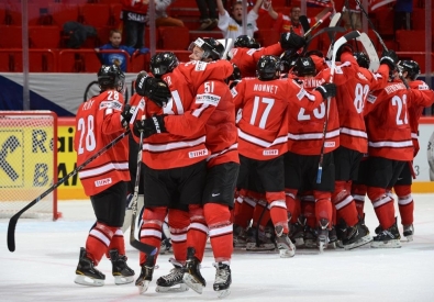 Хоккеисты сборной Швейцарии. Фото Andre Ringuette/HHOF-IIHF Images