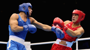 Эхсан Рузбахани (в синем) не забыл олимпийское поражение от Ниязымбетова (в красном) в Лондоне. Фото  с сайта zimbio.com