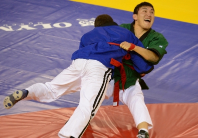 Димаш Молдашев (в зеленом) принес Казахстану первую медаль Универсиады. Новости, Алексей Куденко©