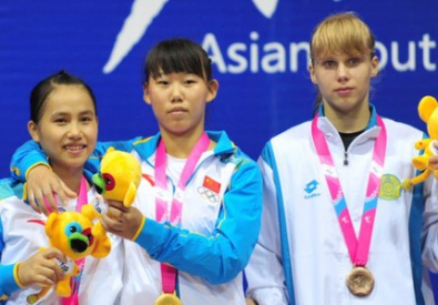 Екатерина Столяренко (справа). Фото с сайта nanjing2013.org