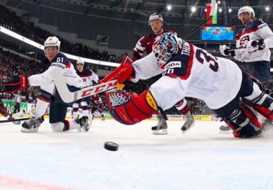 Игровой момент матча США - Латвия. Фото с сайта iihfworlds2014.com