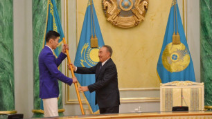 Назарбаев передал знамя страны на Олимпиаду в Рио таэквондисту Руслану Жапарову