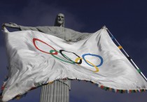 Олимпийский флаг на фоне статуи Христа-Искупителя. Фото Huffington Post