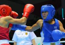 Жайна Шекербекова (в синем). Фото с сайта sk-sport.kz