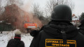Январь 2010 год. Сотрудники федеральной службы судебных приставов в садовом товариществе "Речник", где проходит снос частных домов. Фото РИА Новости