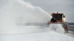 Уборка снега. Фото ©РИА Новости