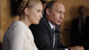Юлия Тимошенко и Владимир Путин. Архивное фото ©РИА Новости