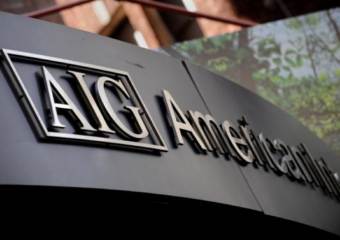 AIG продает автострахование швейцарскому Zurich Financial Services