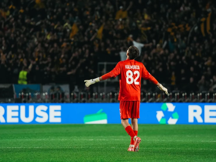 Шерхан Калмурза в матче 