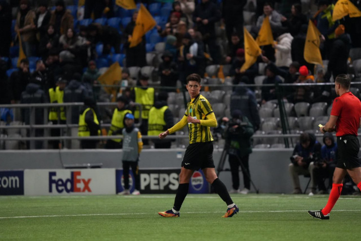 Адилет Садыбеков в матче 